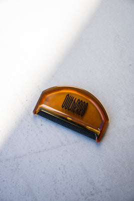 Comb for combing wool